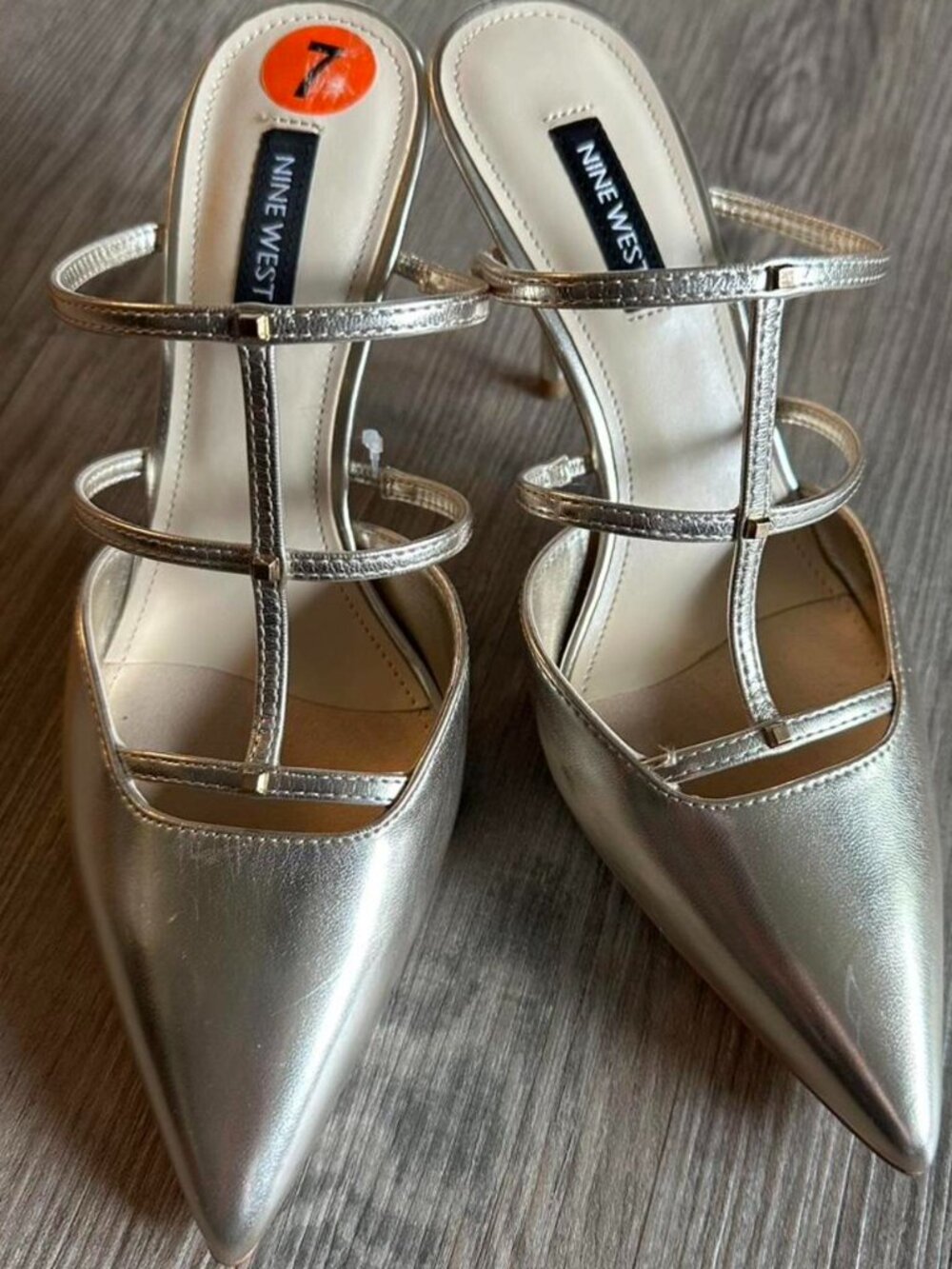 NWT Metallic Gold Nine West 3 3/4 inch Stiletto Heels with pointed toes.